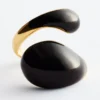 Anello scultoreo a doppia torsione