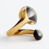 Anello scultoreo a doppia torsione