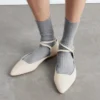Ballerine con cinturini incrociati in pelle