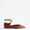 Ballerine con cinturini incrociati in pelle