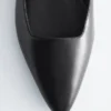 Ballerine con cinturini incrociati in pelle