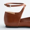 Ballerine con cinturini incrociati in pelle