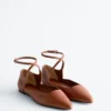 Ballerine con cinturini incrociati in pelle