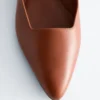 Ballerine con cinturini incrociati in pelle