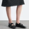 Ballerine in pelle con cinturini incrociati