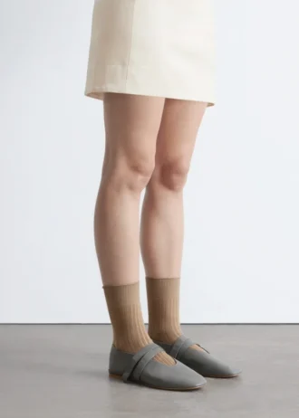Ballerine in pelle con cinturini incrociati