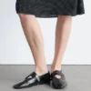 Ballerine in pelle con cinturini incrociati