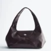 Borsa a spalla in pelle con forma curva