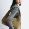 Borsa a tracolla curva