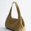 Borsa a tracolla curva