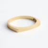 Bracciale rigido angolare