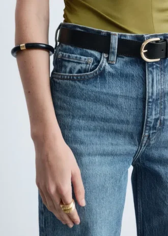 Bracciale rigido in resina con dettagli in metallo a contrasto