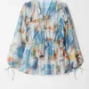 Camicetta con coulisse e arricciature