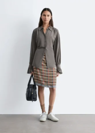 Camicetta con drappeggio e lacci sul retro