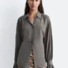 Camicetta con drappeggio e lacci sul retro