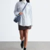 Camicia a righe con tasche applicate
