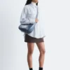 Camicia a righe con tasche applicate
