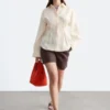 Camicia in lino con vita plissettata
