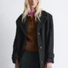 Cappotto in lana con cintura