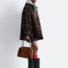 Cappotto in lana dalla linea ad A