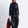 Cappotto in pelle con cintura da annodare