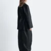 Cappotto in pelle con cintura da annodare