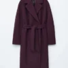 Cappotto voluminoso in lana con cintura