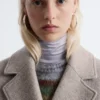 Cappotto voluminoso in lana con cintura