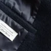 Cappotto voluminoso in lana con cintura