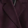 Cappotto voluminoso in lana con cintura