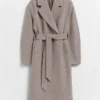 Cappotto voluminoso in lana con cintura
