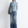 Cardigan con collo alto e zip