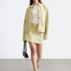 Cardigan oversize in maglia polo