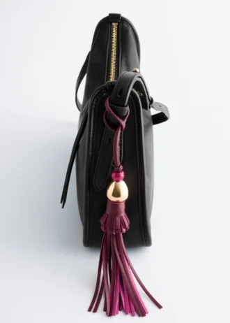 Ciondolo per borsa con nappa in pelle