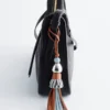 Ciondolo per borsa con nappa in pelle