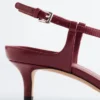 Décolleté con cinturino incrociato in pelle