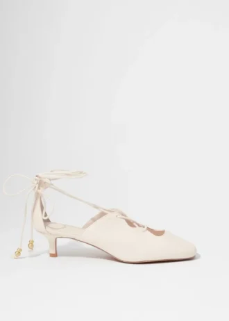 Décolleté in pelle con lacci
