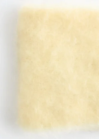 Fascia per capelli con intreccio frontale in misto mohair