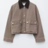 Giacca corta in denim con collo in velluto a coste