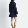 Giacca corta in denim con collo in velluto a coste