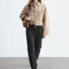 Giacca corta in denim sovratinto