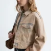 Giacca corta in denim sovratinto