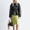 Giacca in pelle con coulisse in vita