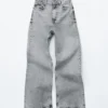 Jeans a gamba larga con borchie
