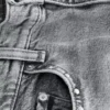 Jeans a gamba larga con borchie