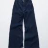 Jeans bootcut con cucitura avvolgente