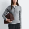 Maglia in lana con mezza abbottonatura