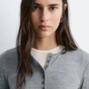 Maglia in lana con mezza abbottonatura