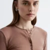 Maglia in lana con mezza abbottonatura