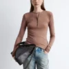 Maglia in lana con mezza abbottonatura